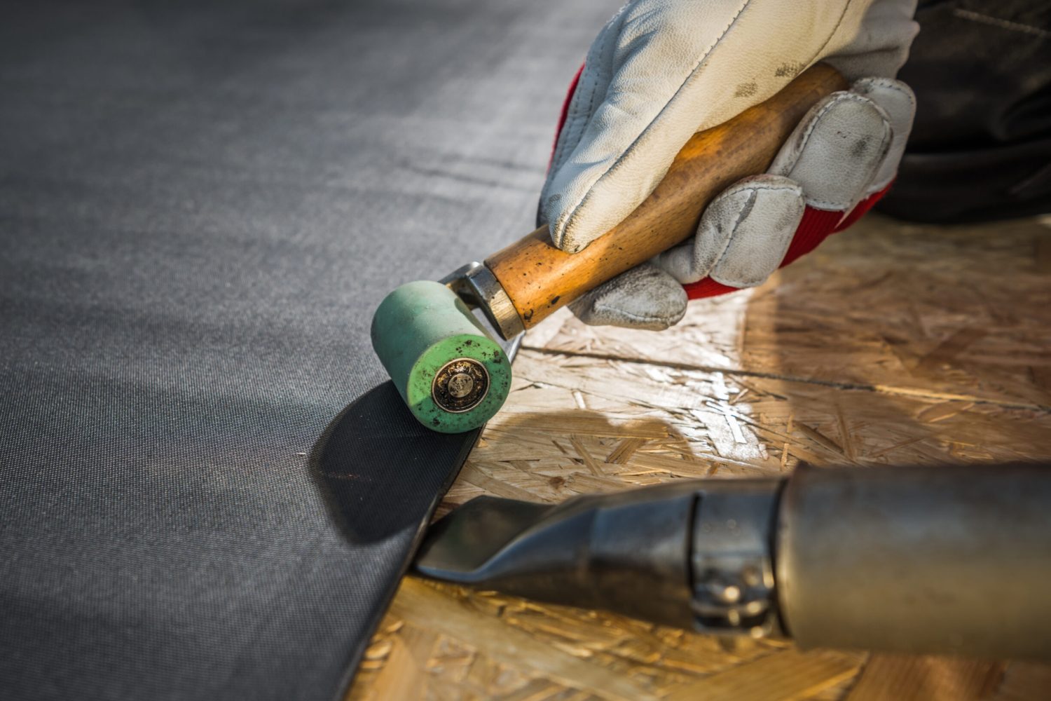 Modern Roof Cover EPDM Rubber Installation Using Air Blower. Roofing Technologies.